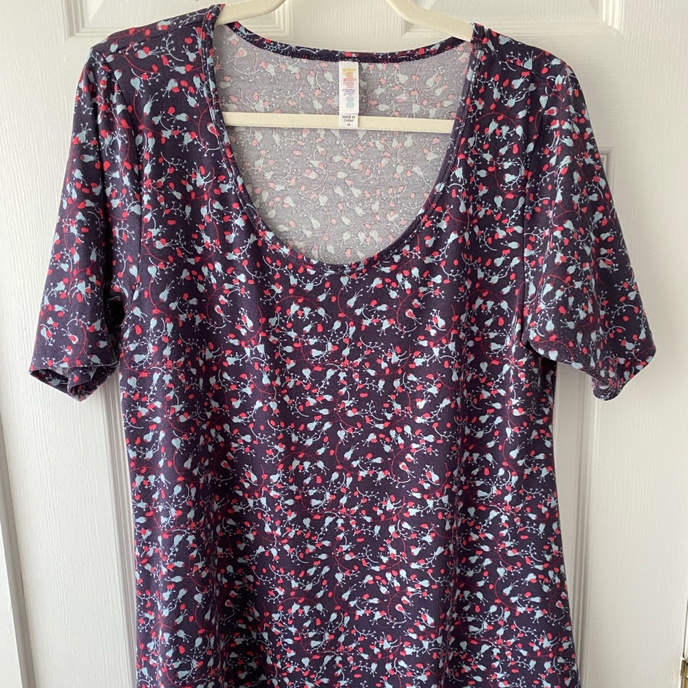 EUC - Medium Lularoe Perfect T - Navy blue with pink floral pattern